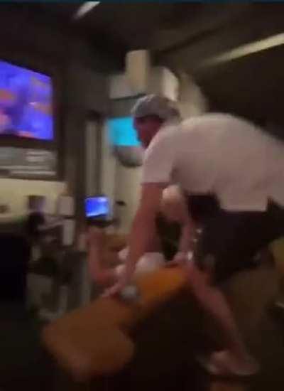 Drunk Tennessee fan tries to rip mounted TV off of bar wall after a win