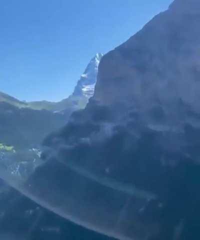 Terrifying hiking path alongside vertical cliff in Switzerland