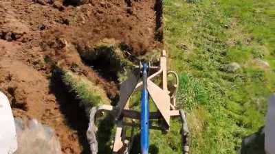 plowing under a hay field with old(er) technology.
