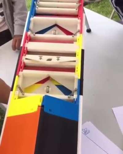 This automatic paper airplane gun, by Dieter Michael Krones.