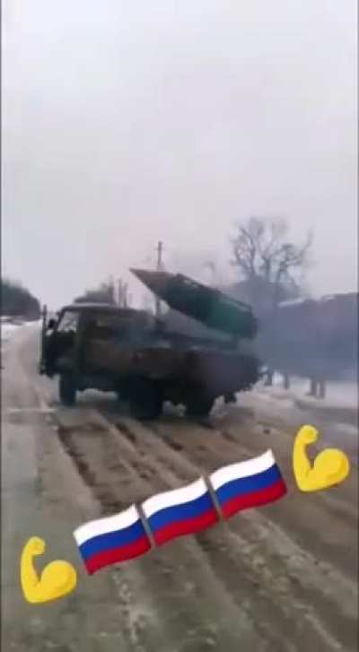 Footage of Russian Buhanka UAZ-452 technical equipped with a B8M1 unguided missile pod firing S-8 80mm rockets towards Ukrainian positions.  