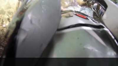 Dirt Biker loses control and falls off cliff