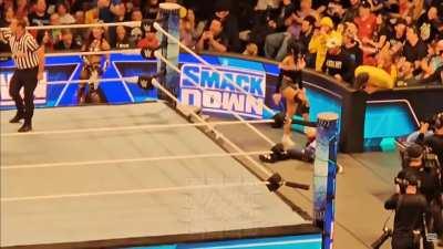 Dakota Kai stepping on Mia Yim's head from a different angle.