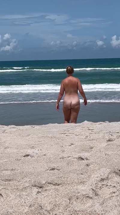 Walking into the ocean