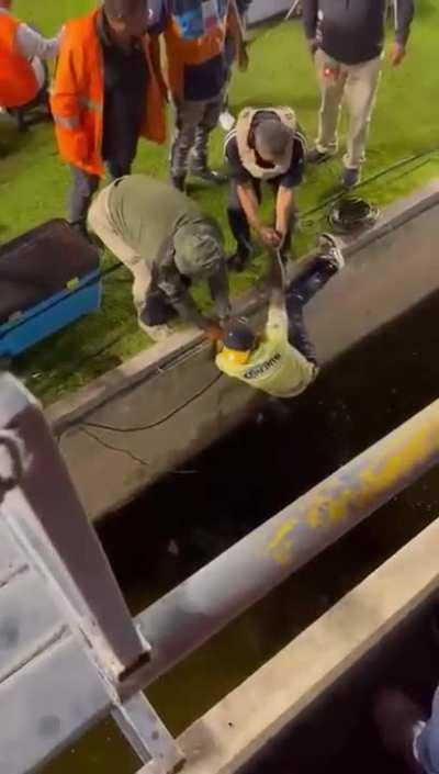 Trying to sneak into the field on a soccer game