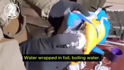 Ukrainian soldier Maloy of the 47th Brigade, gets wounded by a Russian FPV. Ukrainians then deliver him water, medicine, and a note via FPV: 