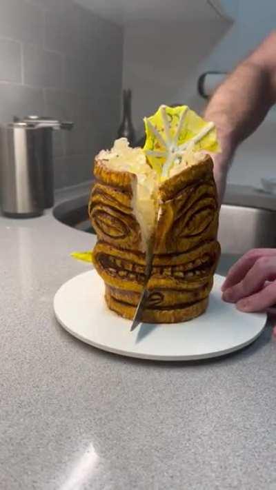 I made a tiki themed cake for hubby’s birthday. 🗿 It’s a coconut rum cake filled with coconut rum Swiss meringue buttercream, sculpted in modeling chocolate and topped with isomalt “crushed ice” and a wafer paper umbrella. 🥰