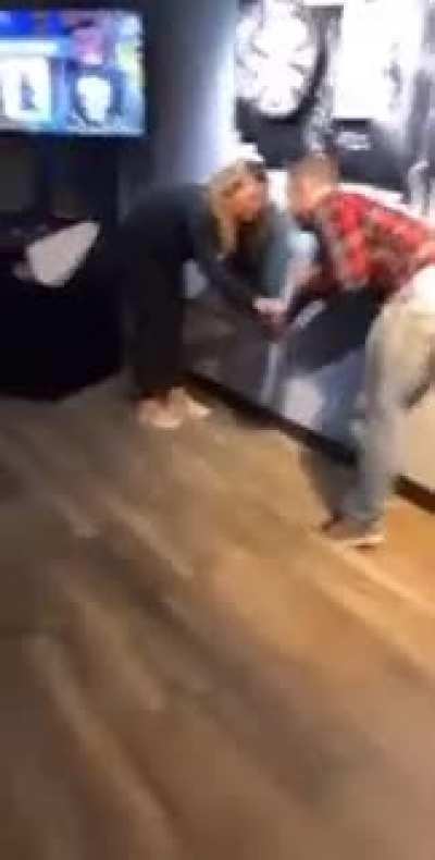 WCGW hanging dartboards near a water pipe