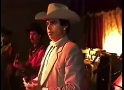 Chalino Sanchez gets passed a note from the cartel saying he will be killed as soon as he walks out,and he keeps singing anyways.(He was murdered later that night)