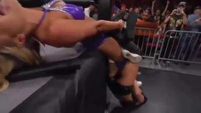 Taryn Terrell is pulled into the ringpost and then leg locked to increase the pressure