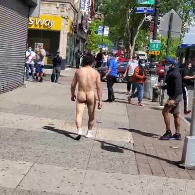 Naked man running and getting into fights
