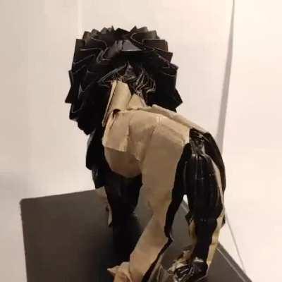 An origami lion folded from a single square of paper