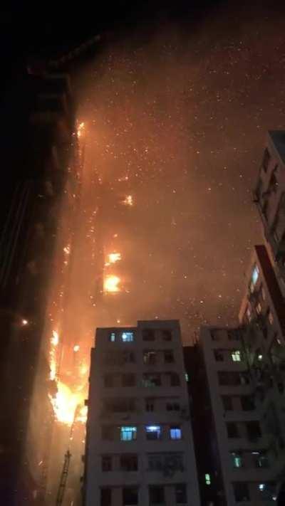 A skyscraper on fire