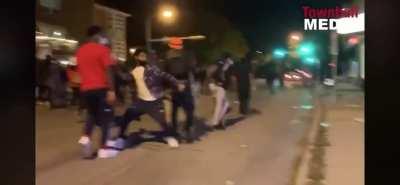 Peaceful Protesters breaking windows in Wauwatosa