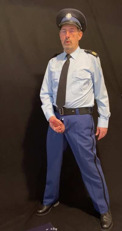 Dutch cop playing with his nightstick