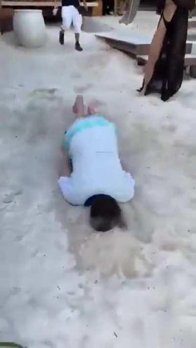 Doing the worm across bare sand