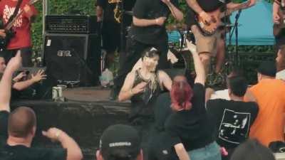 Drinking in a mosh pit