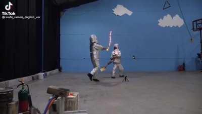 Slamming molten iron with a shovel!