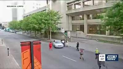 Protestors attacking driver get ran over - news context also in video