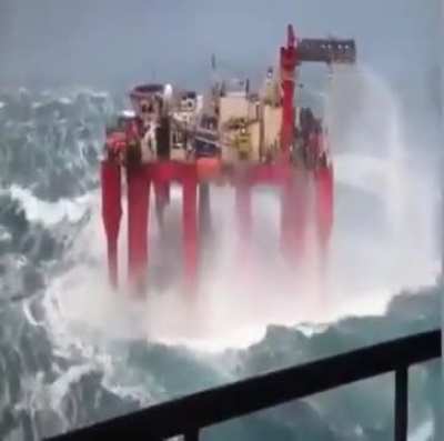 Floating oil platform in a storm in North Sea 