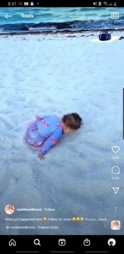 folds in half then plots her revenge on the beach