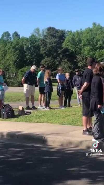 Protesters gather outside the women’s health clinic to waste their lives