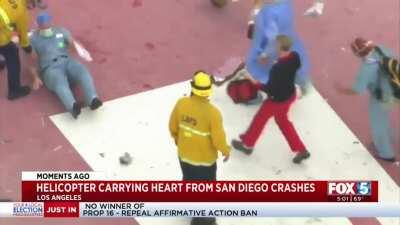 Helicopter varying transplant heart crashes, firefighter saves heart, gives to doctor, doctor trips and drops heart; heart survives all this and is successfully transplanted! Some kind of magic was working this day..