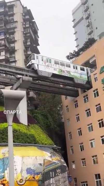 This Train going through a building