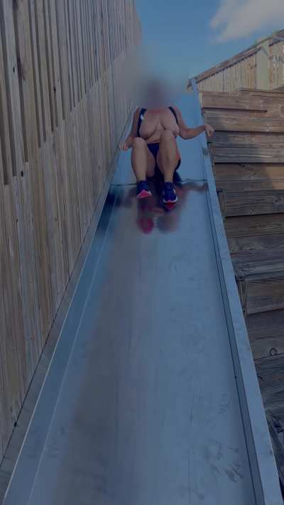 Been years going down a slide! 1st time doing it topless!