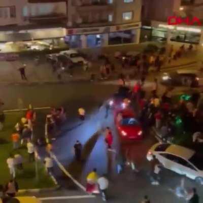 Turkish Madman Loses His Patience With The Street Celebrations Blocking Traffic So They Get Run Over