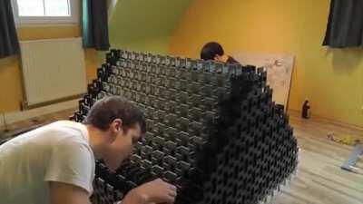 Guy accidentally knocks down a 10,000 domino structure prematurely