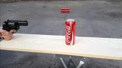 Nick shoots Coach's cola