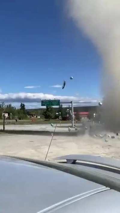 Dust devil destroys a fruit stand in Yukon, Canada