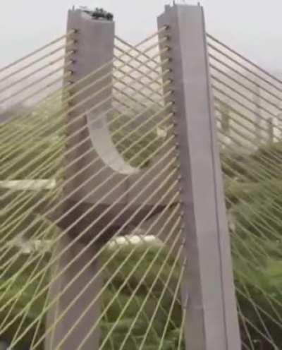 As I skate on the top of this bridge