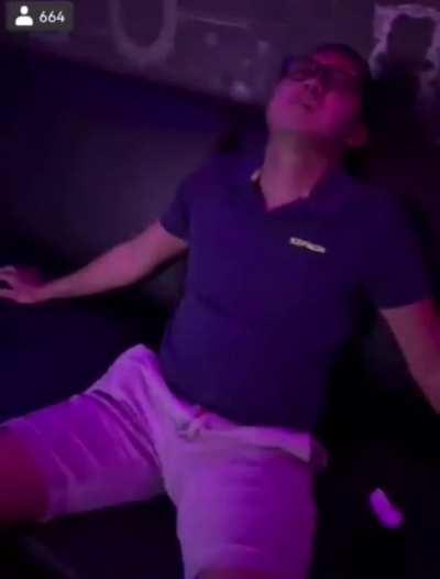 His wife records a video of him playing dead on the sofa