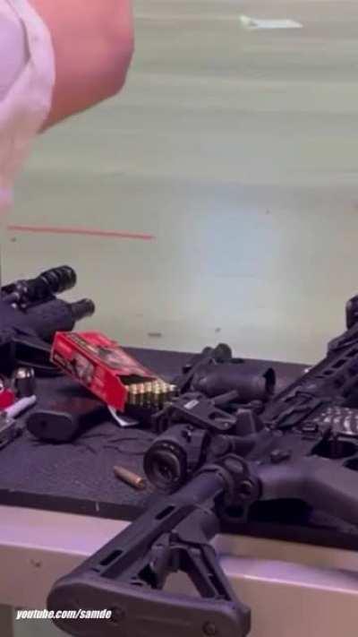 Spent casing bounces off wall and hits primer on table.