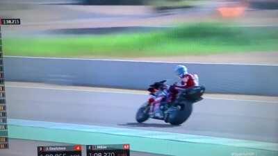 Dovi demonstrating throttle control while looking behind and wheeling out of Turn 10 Jerez
