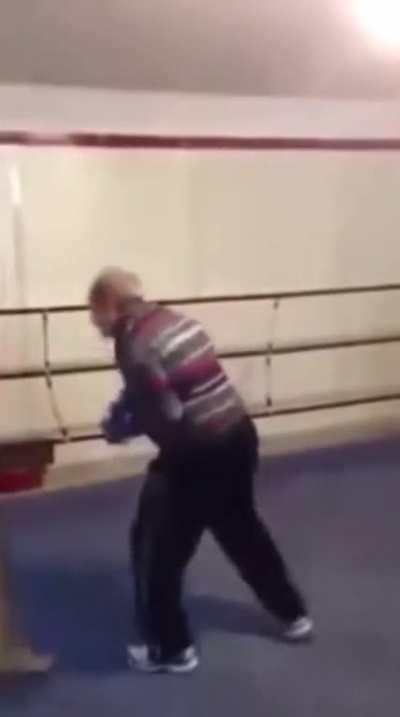 80 year old boxer teaches young man a lesson