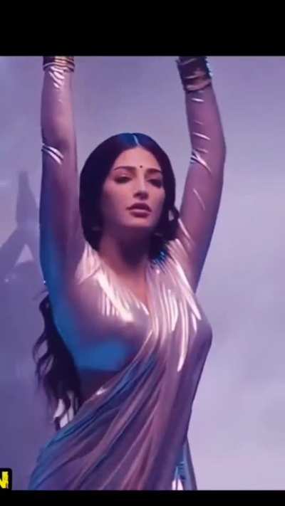 Ufff...just look at the curves of Shruti in that sexy saree!! And yes, don't miss the nippy poke. Pure heaven