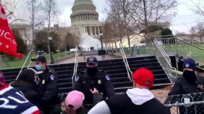 The exact first moment of the storming of the U.S. Capitol today.