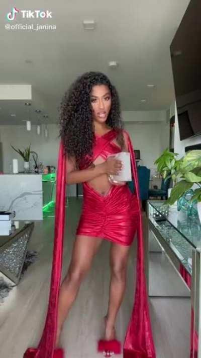 Her Outfits Are Fire As HELL