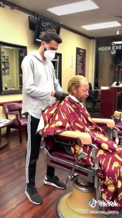 Barber giving a homeless guy a free haircut!
