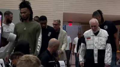 The entire San Antonio Spurs team escorted Gregg Popovich to his first press conference since suffering a Stroke