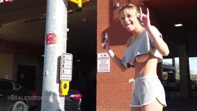 Who is this stretching on a street corner?