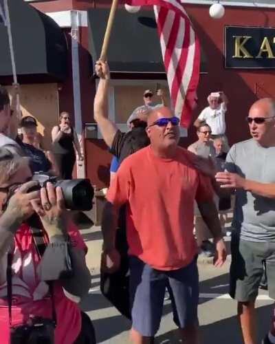 Racist Counter Protester slips up on Peaceful black protestor and calls him the N word