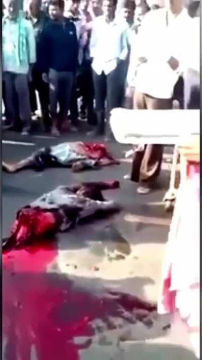 Guy cut in half and alive being picked up by paramedics. Presumably motorcycle accident.