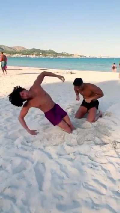 Blowing his Beach Buddy..