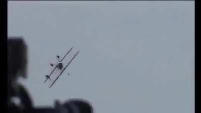 Wing walker killed when plane crashes on top of her