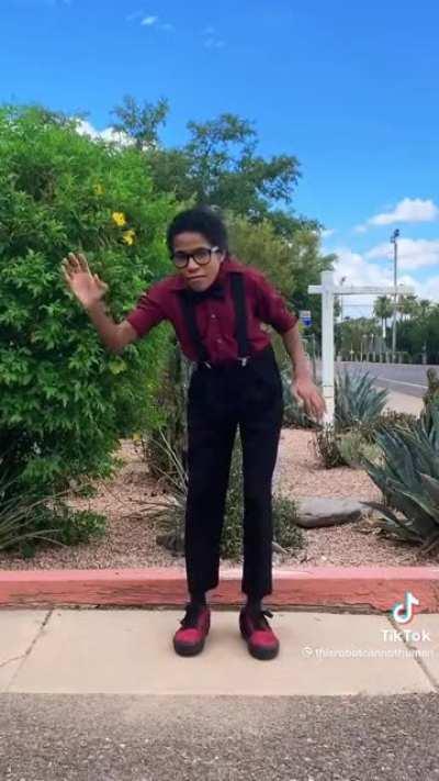 This person dances like a robot trying to convince us it's a human