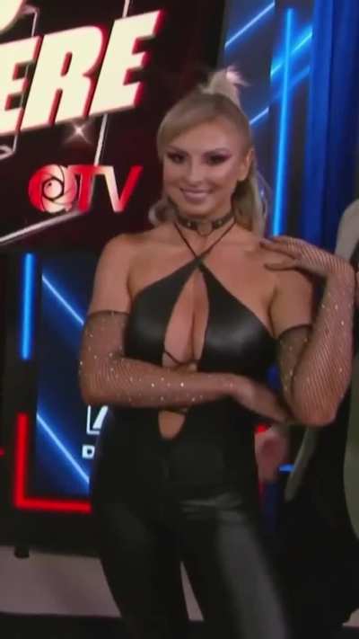 Harley Cameron in leather showing some major cleavage